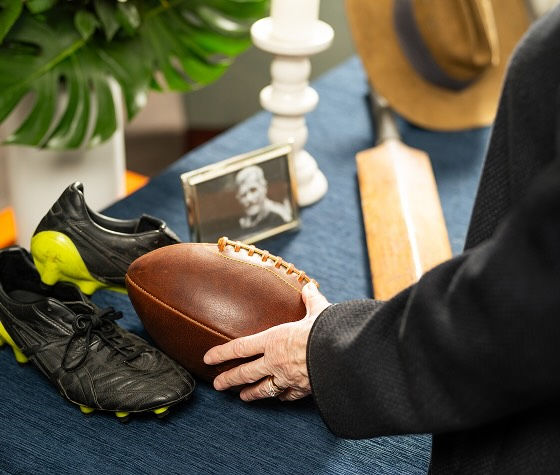 a person holding a football